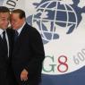 Moment de confidència entre el president gal i l'amfitrió Berlusconi.